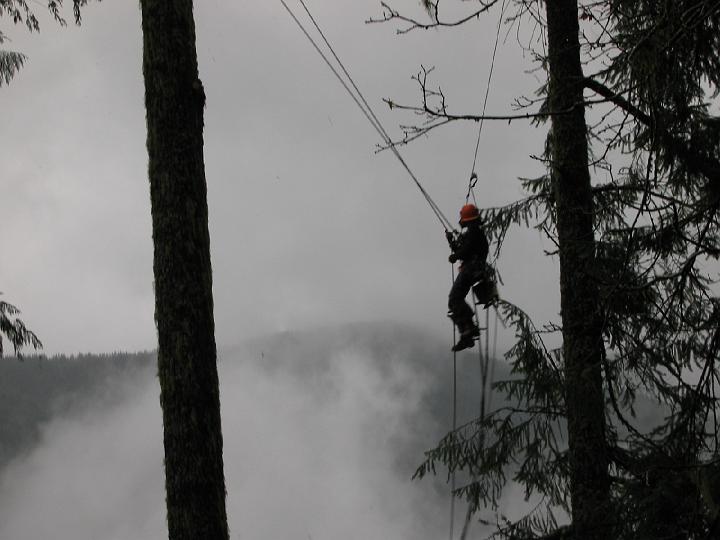 climbing5.JPG - SCSS climber in the middle of a claw shot.